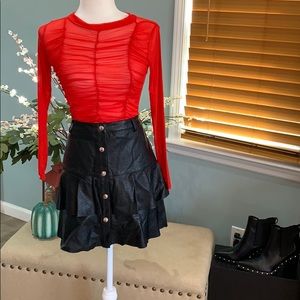 Brand new pleather skirt with a see through shirt